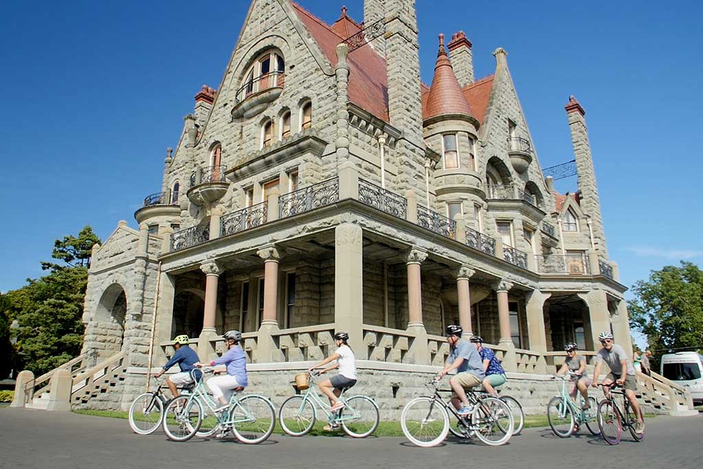 Cruise past the stunning Craigdarroch Castle. Photo: The Pedaler Bicycle Tours