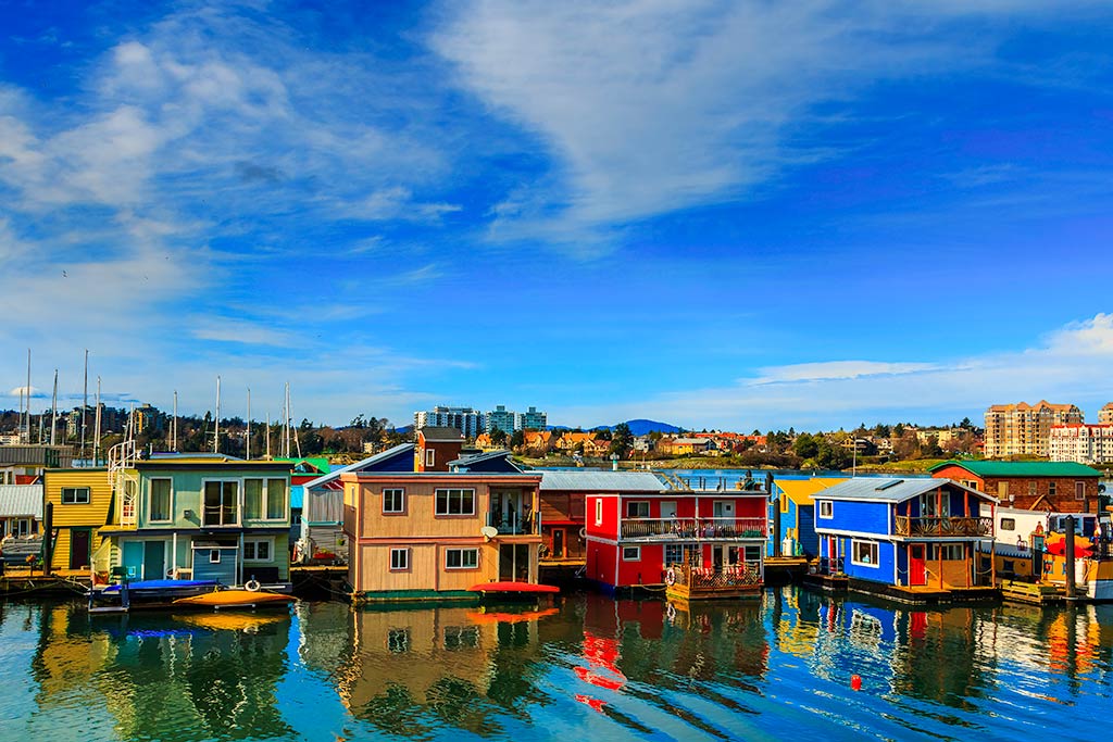 Wander through a colorful collection of floating houseboats along Fisherman’s Wharf. Credit: Erik Lawrenz