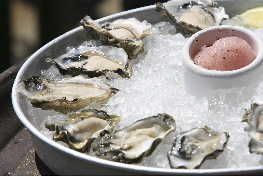 Slurp up any of the fresh varieties of oysters offered at Elliott's. Credit: Mike Urban